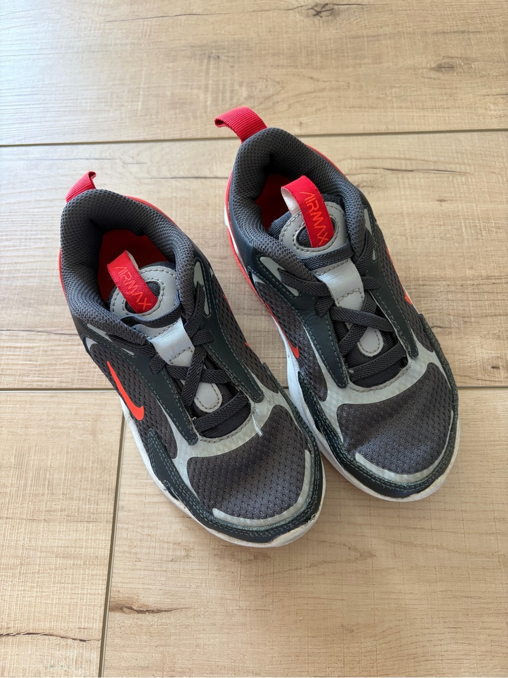 Nike Kids Gray and Red Athletic Sneakers with Red Swoosh